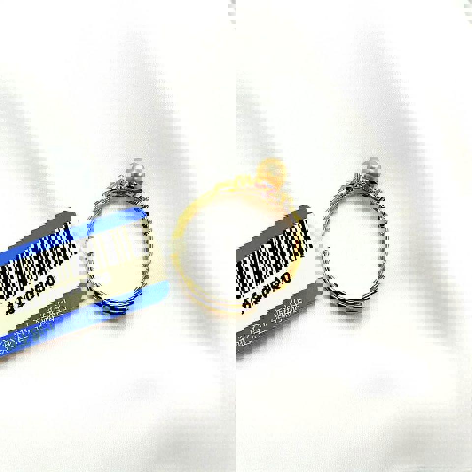 Elegant Gold Ring with Natural Seawater Gold Pearl and Accent Stone in S925